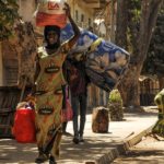 Gambia refugees return